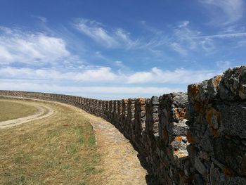 Scenic view of wall against sky