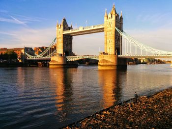 Tower bridge over thames river against sky