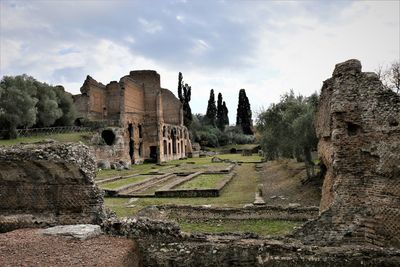 Old ruin building against cloudy sky