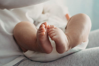 Newborn baby skin care. close up of baby feet. feet of newborn baby. happy family and parenthood