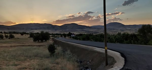 Scenic view of landscape against sky during sunset