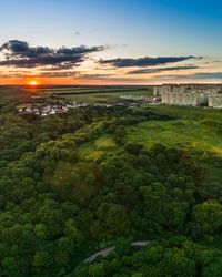 Scenic view of landscape against sky during sunset