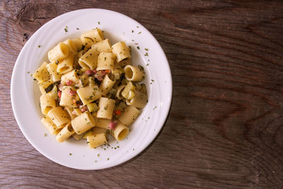 High angle view of pasta in bowl on table