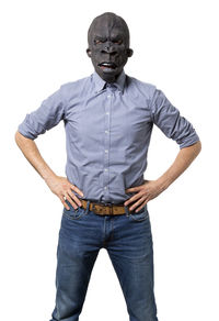 Portrait of man standing against white background