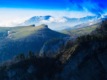 Scenic view of mountains against sky