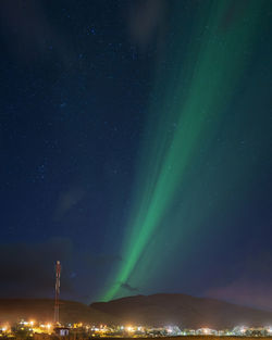 Scenic view of sea against sky at night