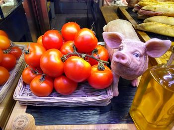 High angle view of tomatoes in basket on table