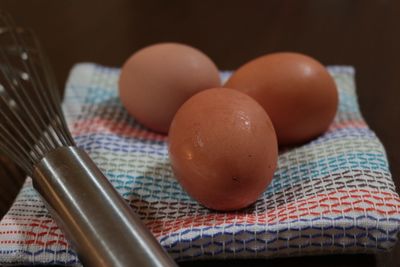 Close-up of eggs in plate on table