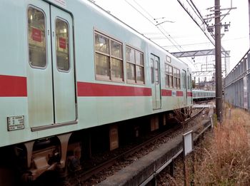 Train on railroad station platform against sky