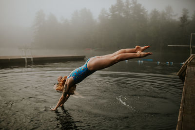 Side view of woman in water