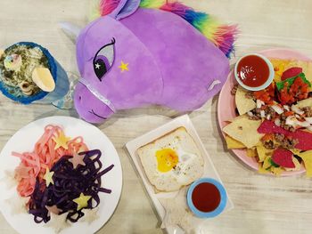 High angle view of breakfast served on table