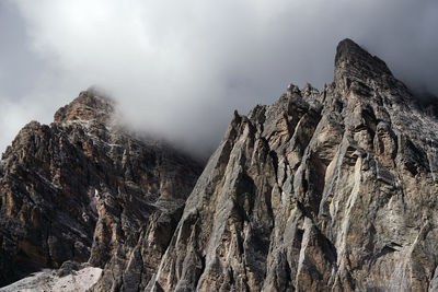 Panoramic view of rocky mountains against sky