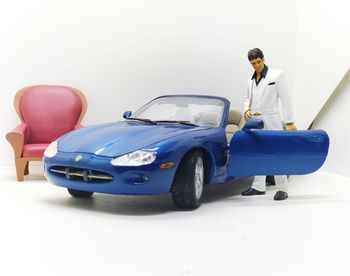 Toy car against white background