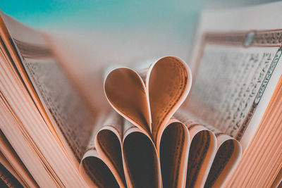 Close-up of heart shape on book