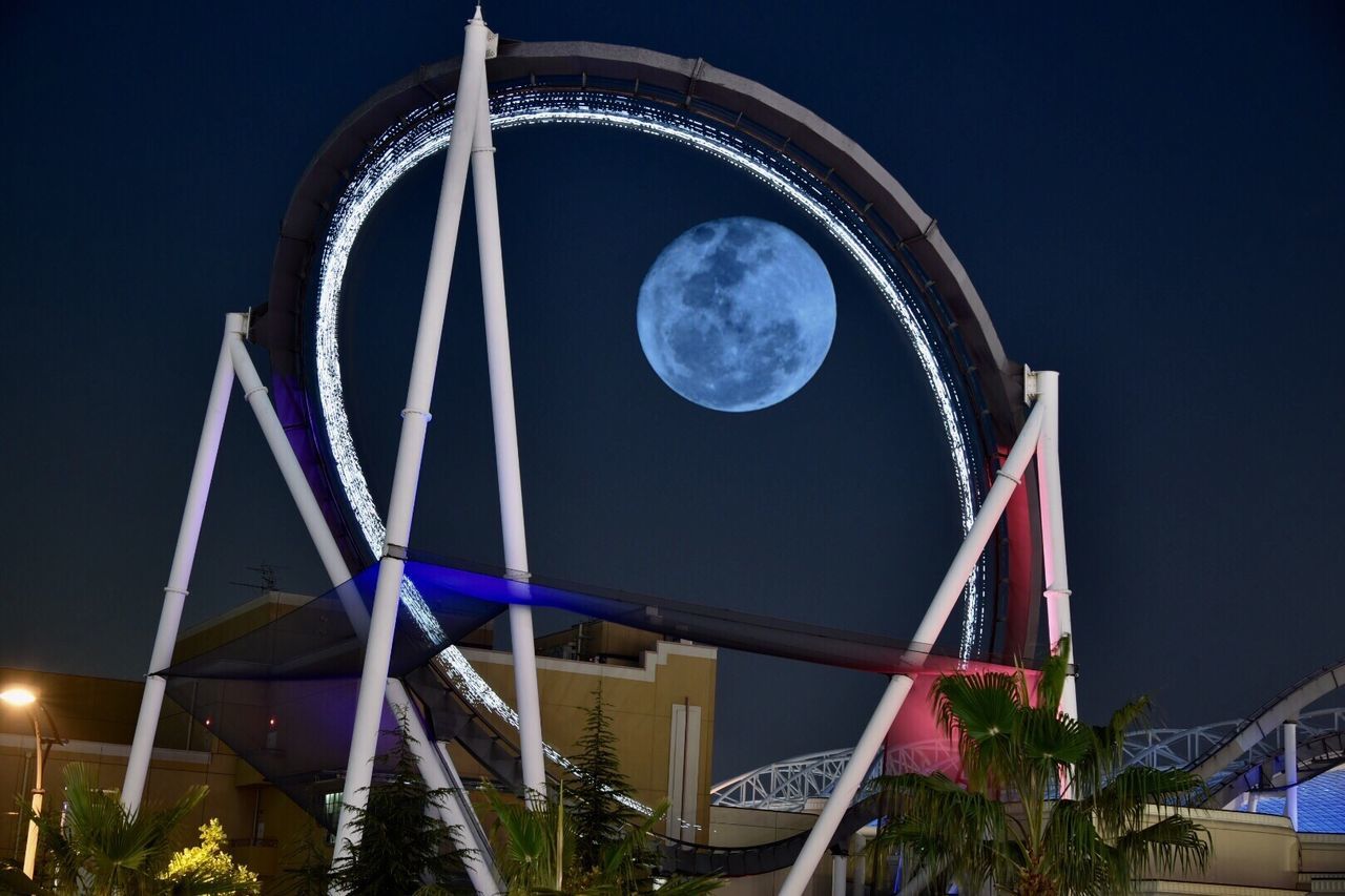 ferris wheel, low angle view, night, sky, amusement park ride, amusement park, outdoors, no people, architecture, big wheel, astronomy