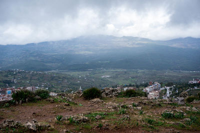 Scenic view of townscape against sky