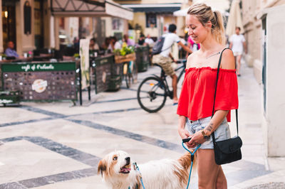 Man with dog on the street