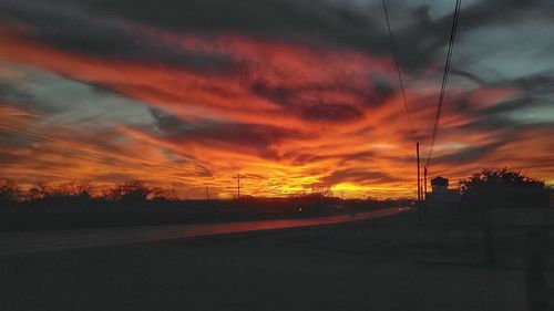 Scenic view of landscape against sky during sunset