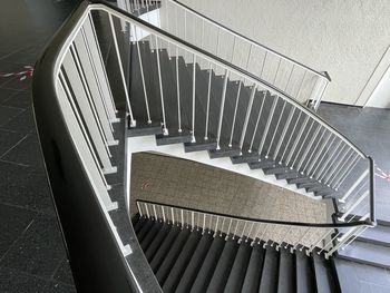 High angle view of spiral staircase in event building