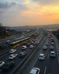 High angle view of traffic on road at sunset