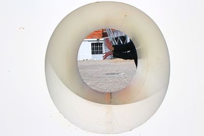 View of human hands through a hole 