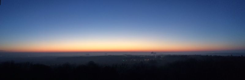 Scenic view of landscape at sunset