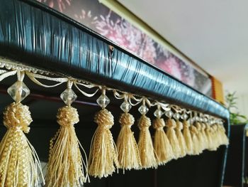 Low angle view of clothes hanging on wall