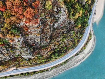 Scenic view of sea by mountains