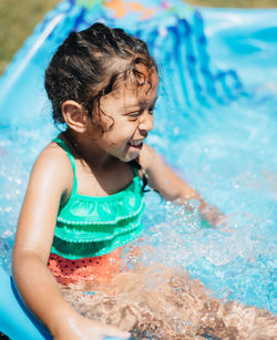 High angle view of girl in swimming pool