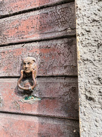 Close-up of statue against wall