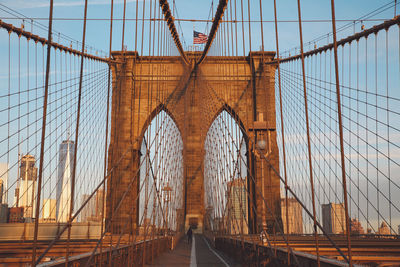 Brooklyn bridge against sky in city