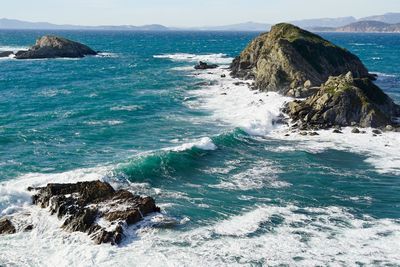Scenic view of sea against blue sky