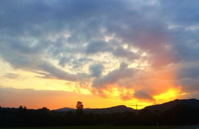 Scenic view of silhouette landscape against sky during sunset