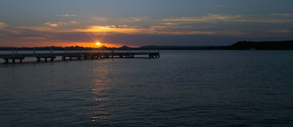 Scenic view of sea at sunset