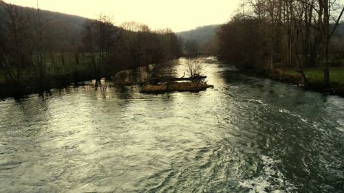 Scenic view of river against sky