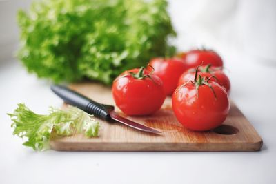 Close-up of tomatoes on cutting board