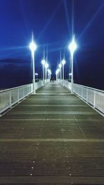 Illuminated street lights at night