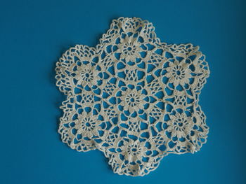 Close-up of place mat on blue background