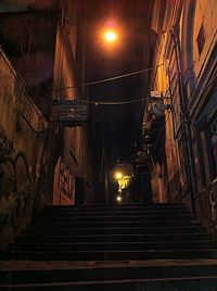 Low angle view of staircase at night