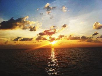 Scenic view of sea at sunset