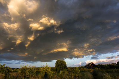 Scenic view of dramatic sky during sunset