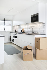 Cardboard boxes in kitchen