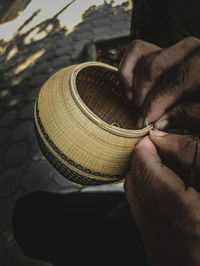 Close-up of man holding cigarette