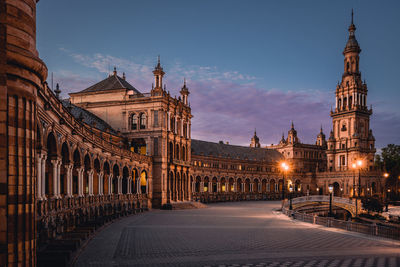 Illuminated buildings in city at night