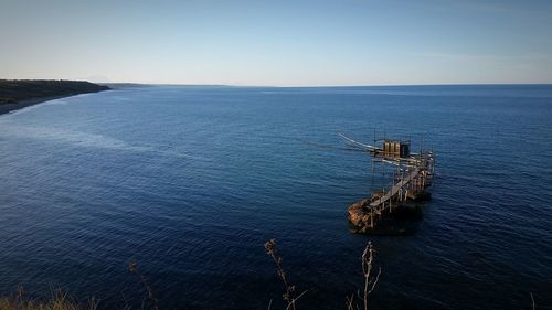 High angle view of sea against clear sky