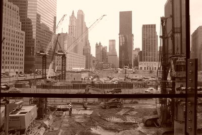 Modern buildings in city against sky
