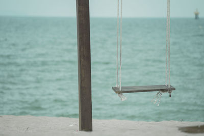 Close-up of rope on beach