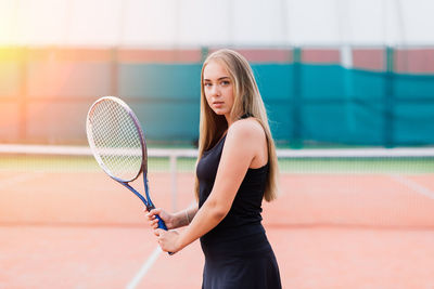 Young woman playing tennis