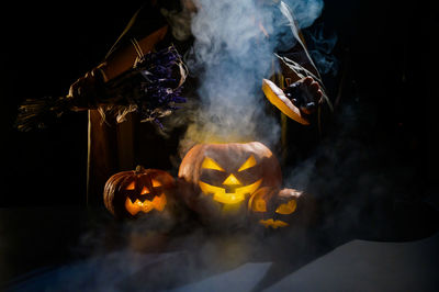 Close-up of fire hydrant against black background