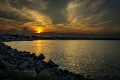 Scenic view of sea against sky during sunset